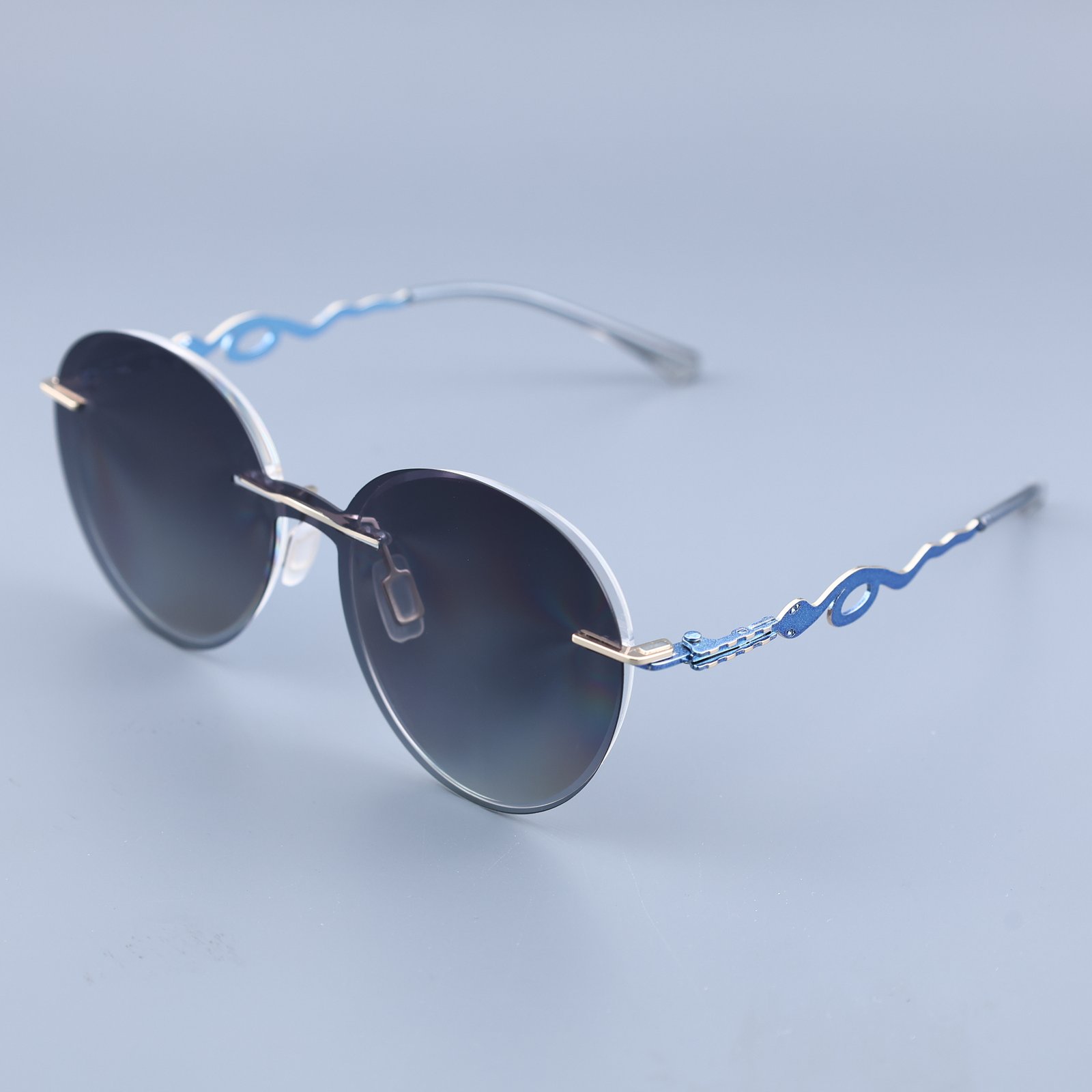 OG Azure Wave | Rimless Round Sunglasses For Women