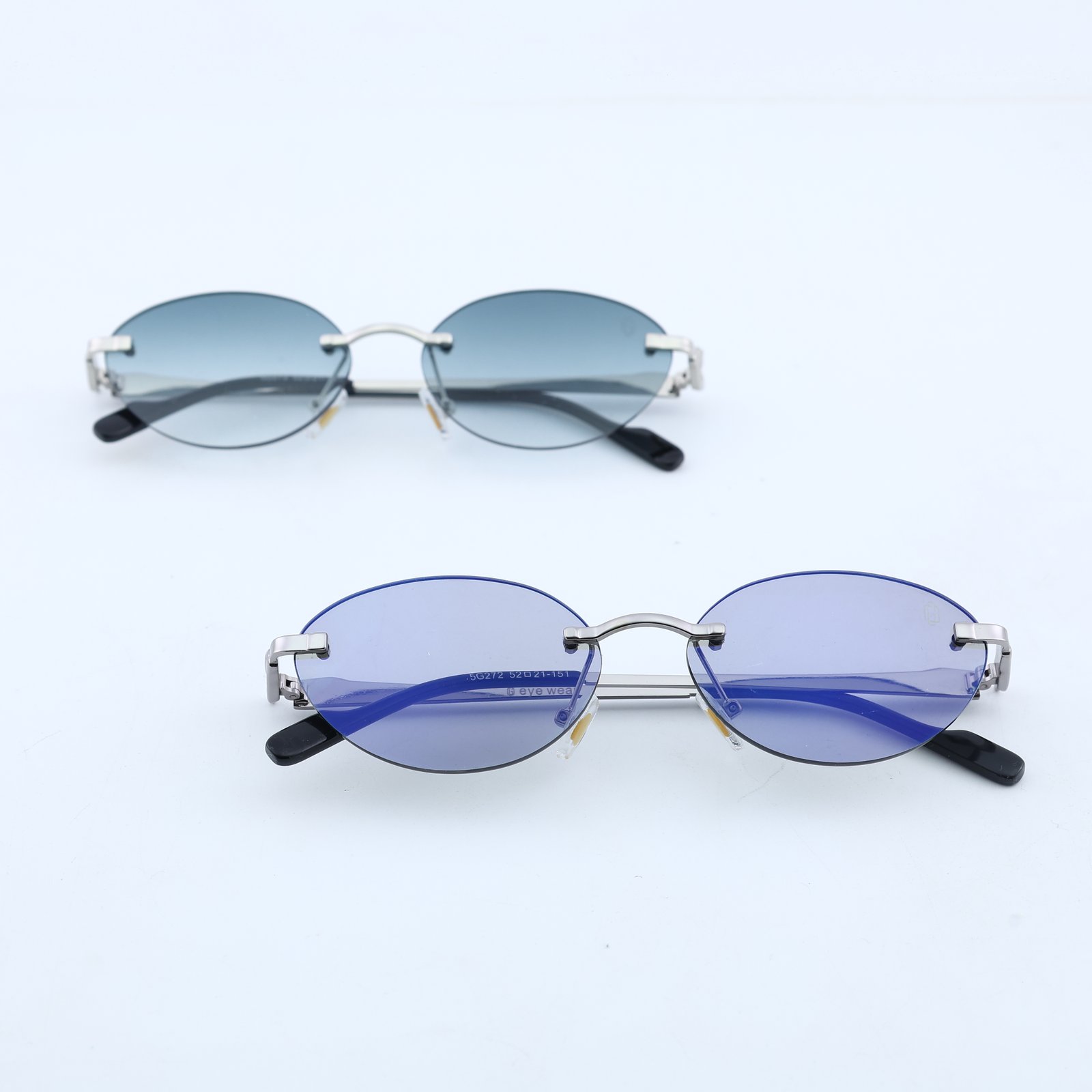 OG Sky Drift | Silver Rimless Oval Blue Sunglasses